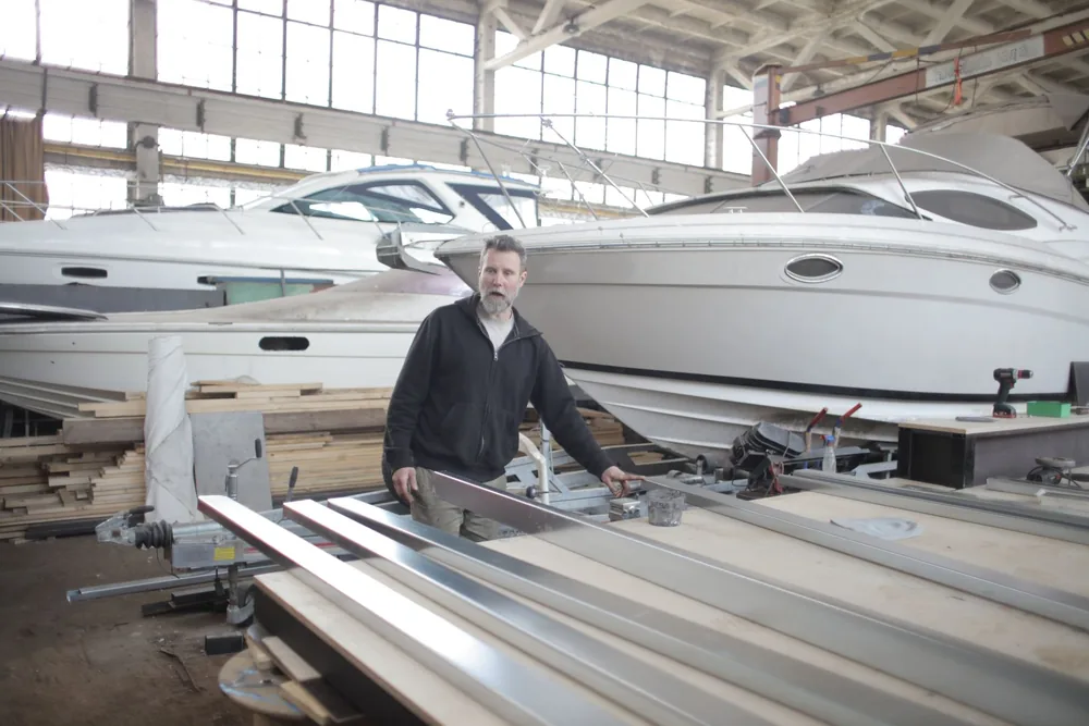 Motor yachts under refit in the covered hall