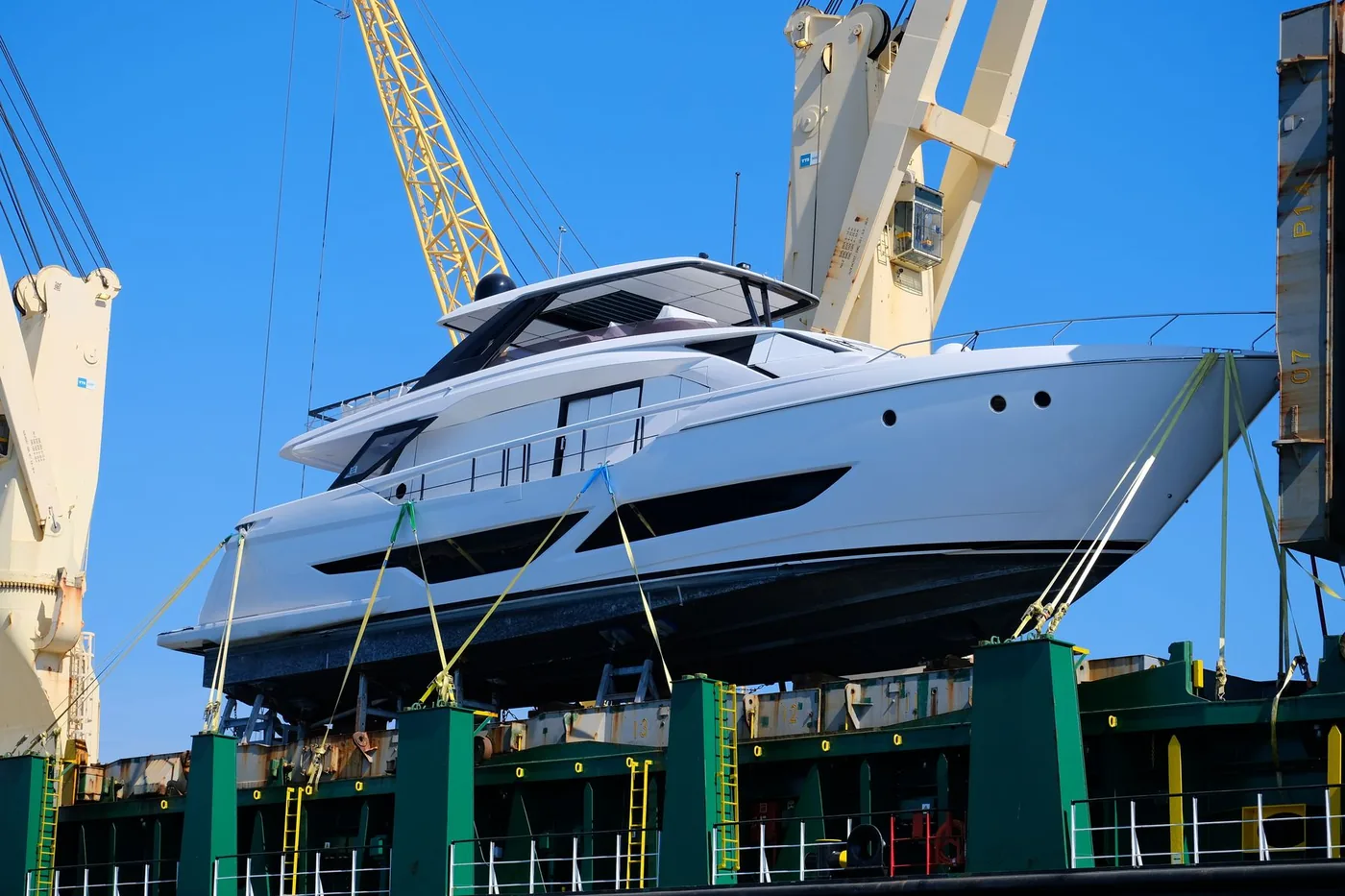 Yacht in the travel lift at the yard